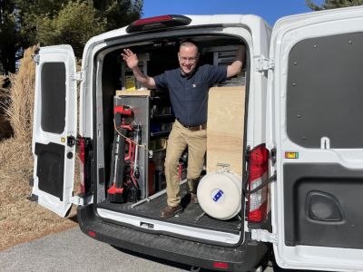 Man Standing Inside Work Van With Tools And Equipment Odenton Md